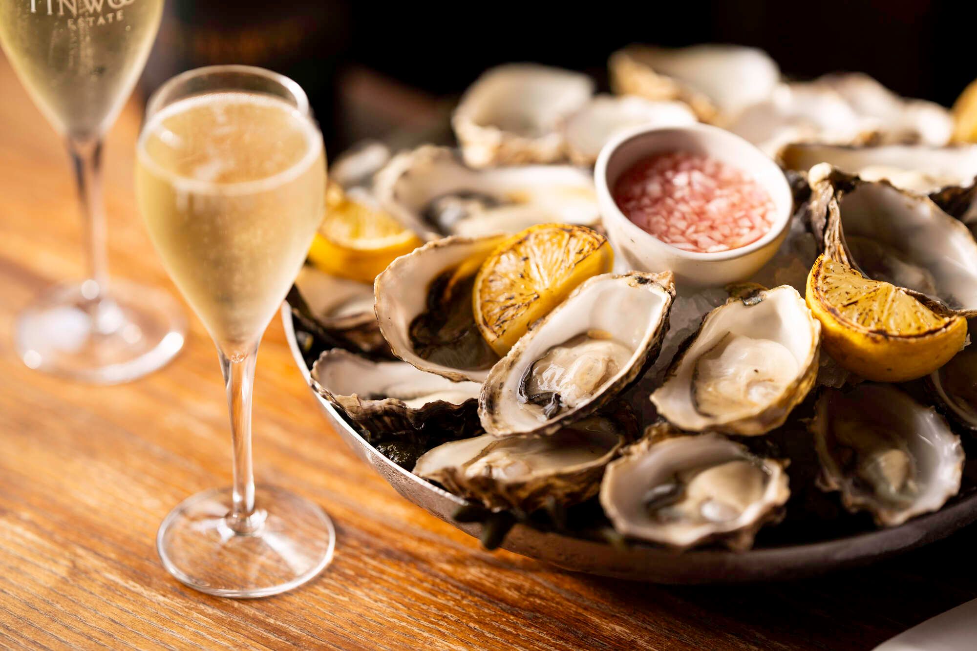 Oysters with lemon and glass of Champagne